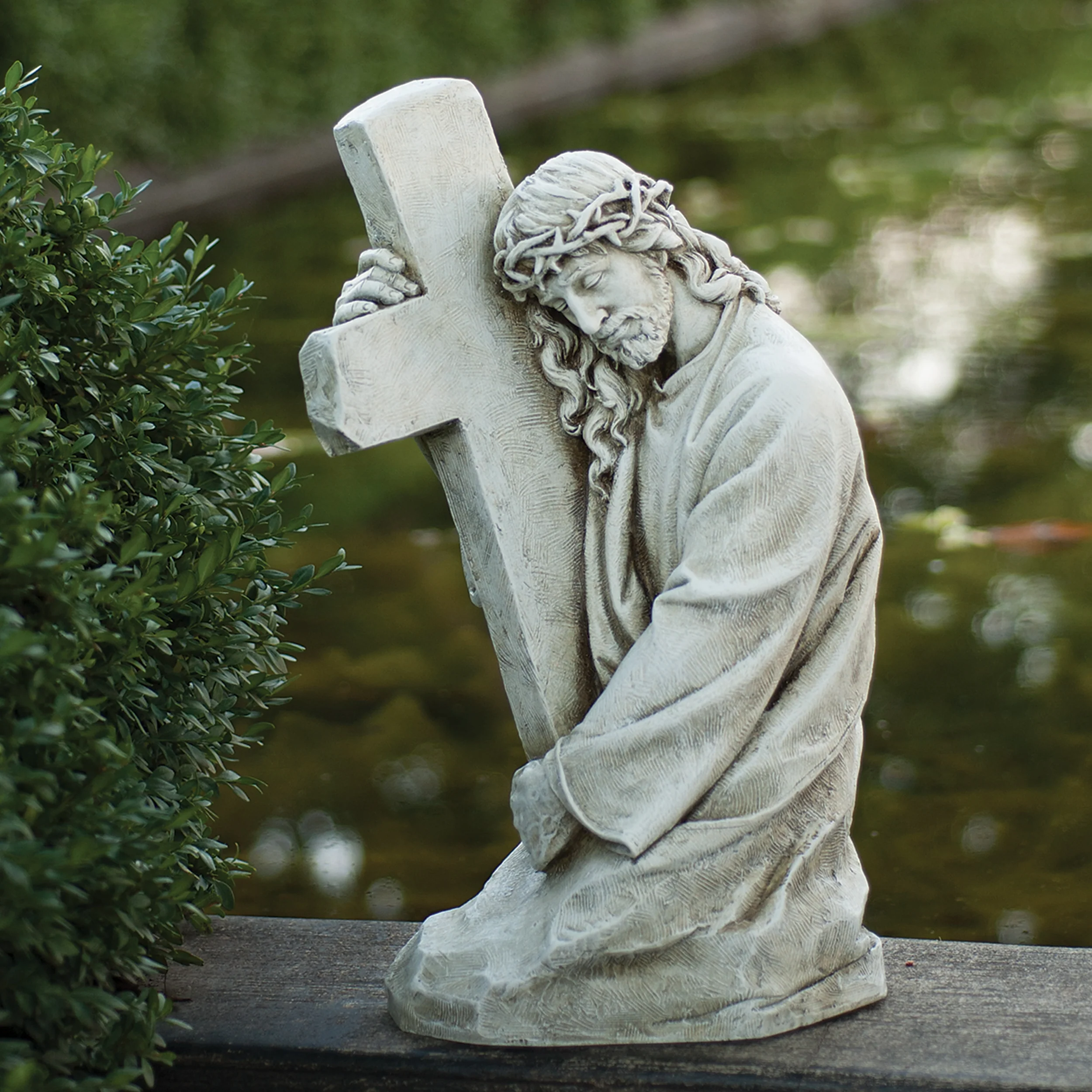 Joseph's Studio Jesus Holding Cross Garden Statue